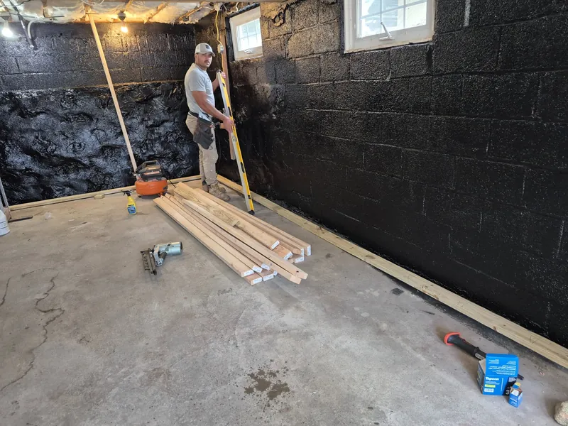 Basement framing going in along the block walls